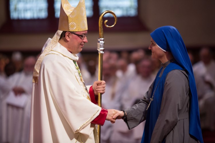 Mother Parousia greeting His Excellency Most Reverend Bishop Miehm