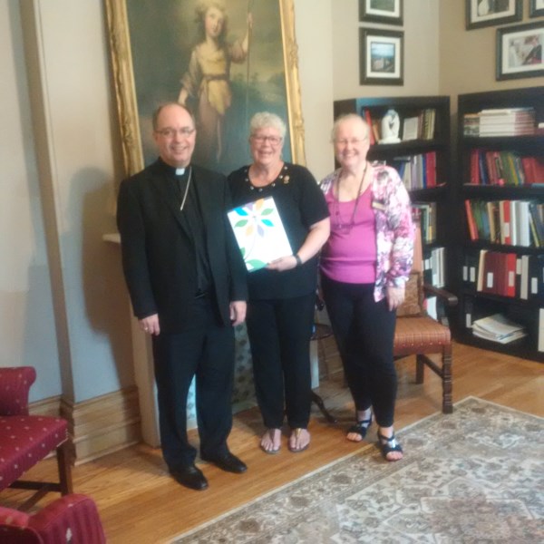 Bishop Miehm with CWL Members