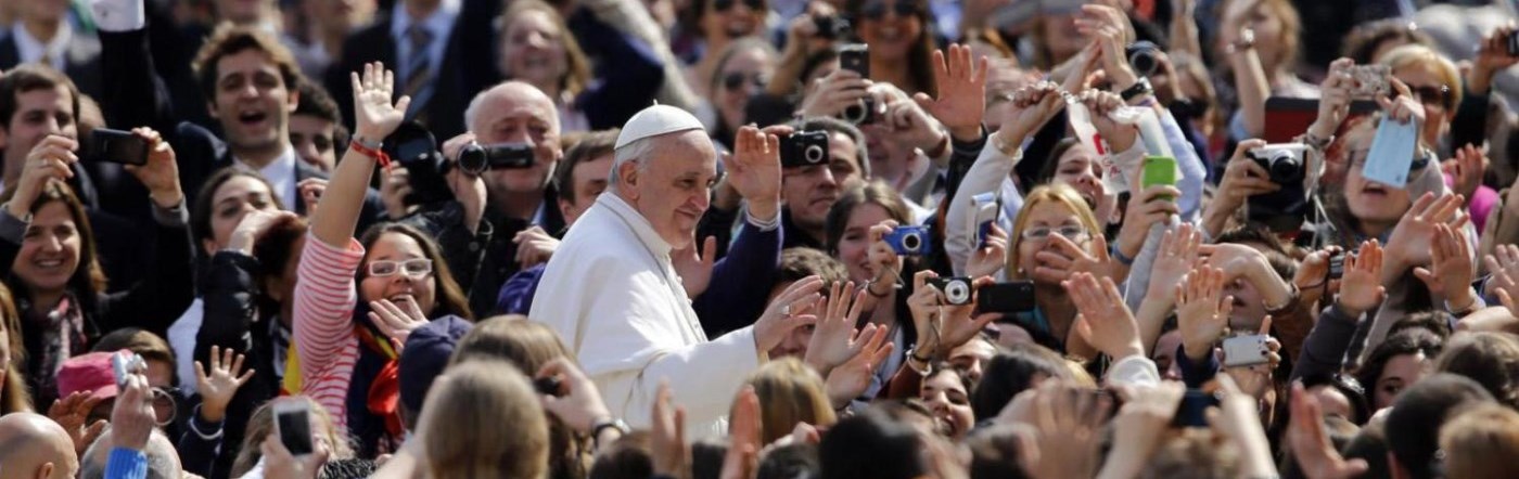 Pope Francis with the crowds of people