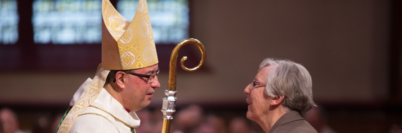 CSJ Sister greeting His Excellency Most Reverend Bishop Miehm
