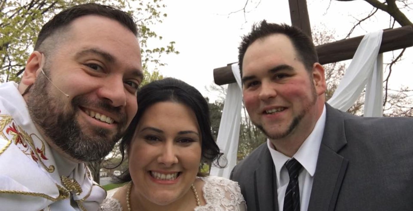 Fr. Jerry Tavares with a couple getting married at St. Alphonsus Liguori Parish
