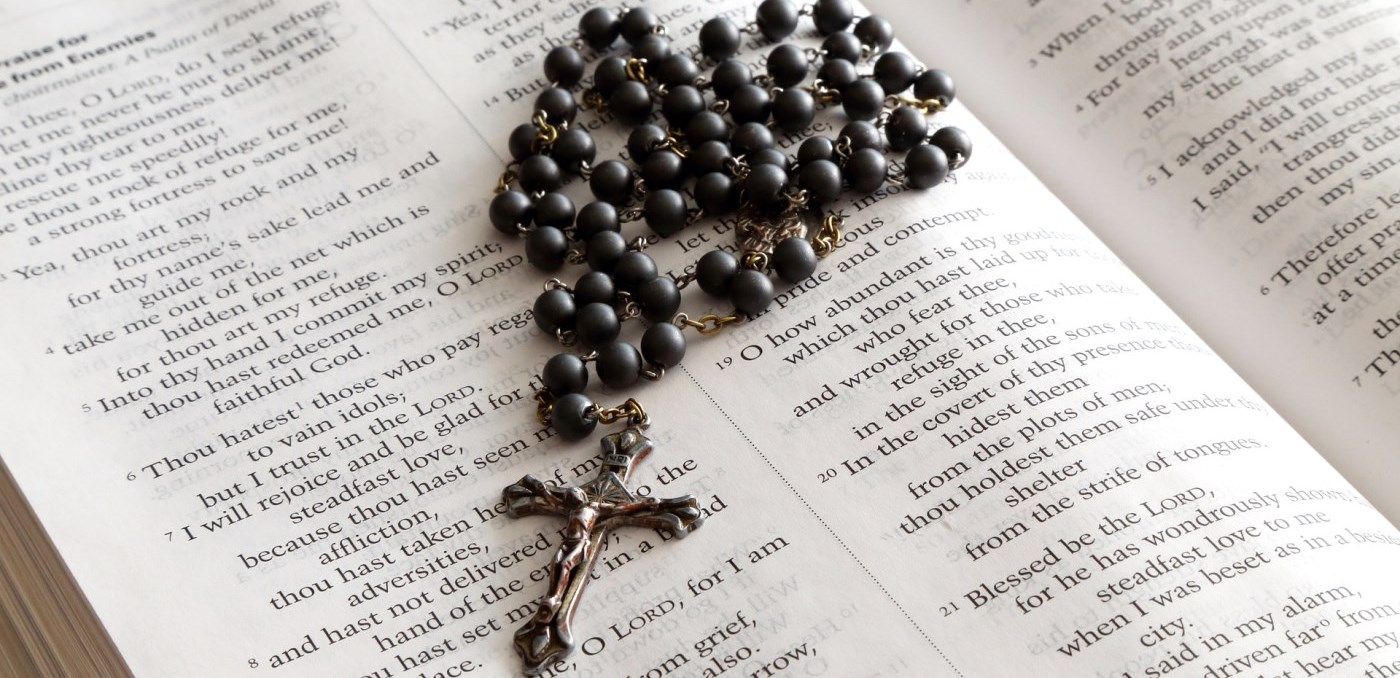 Rosary on a bible