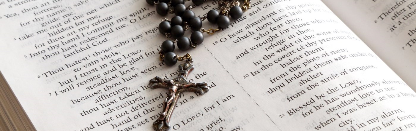 Bible with rosary