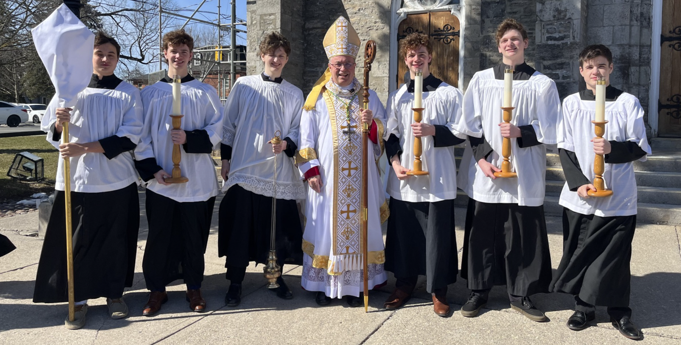 Bishop Miehm with altar servers