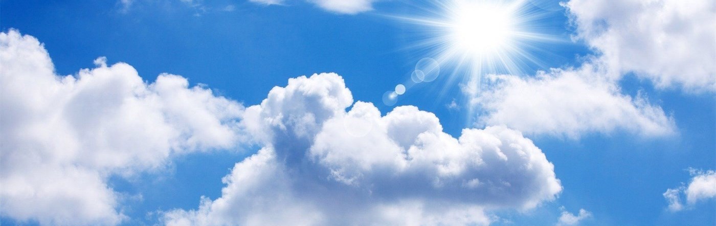 Sky with the clouds and the sun