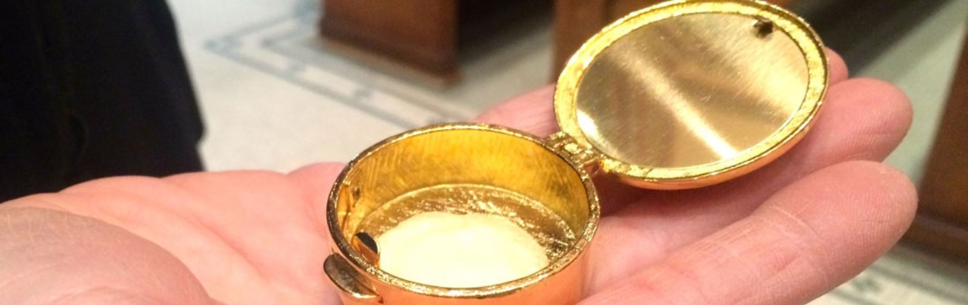 Holy Communion in a pyx