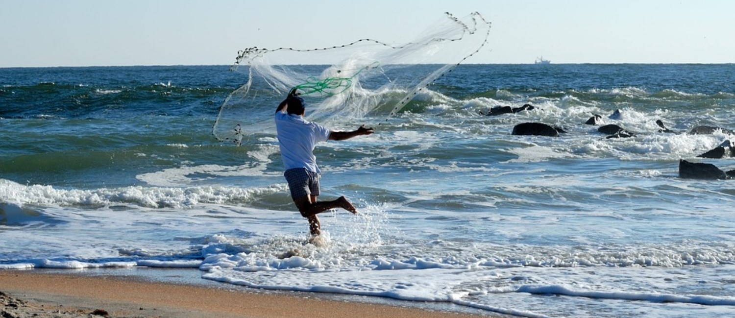 Fisherman casting the net