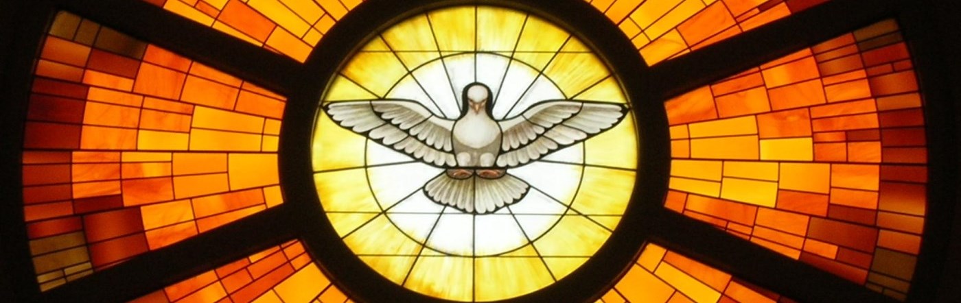 Stained glass window of the Holy Spirit in St. Peter's Basilica in Rome