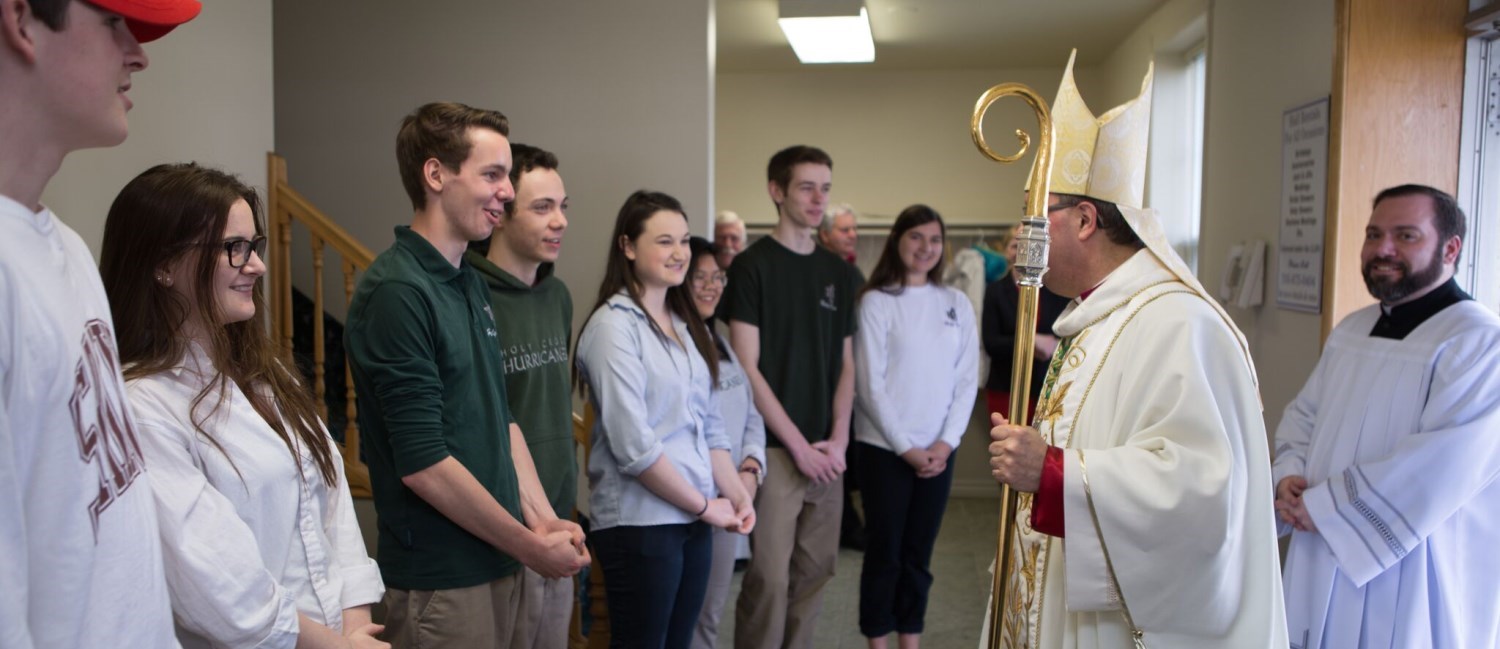 Bishop Miehm greeting the youth