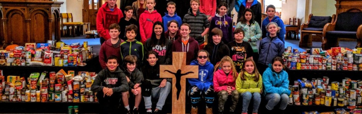 Elementary Students doing good works of charity